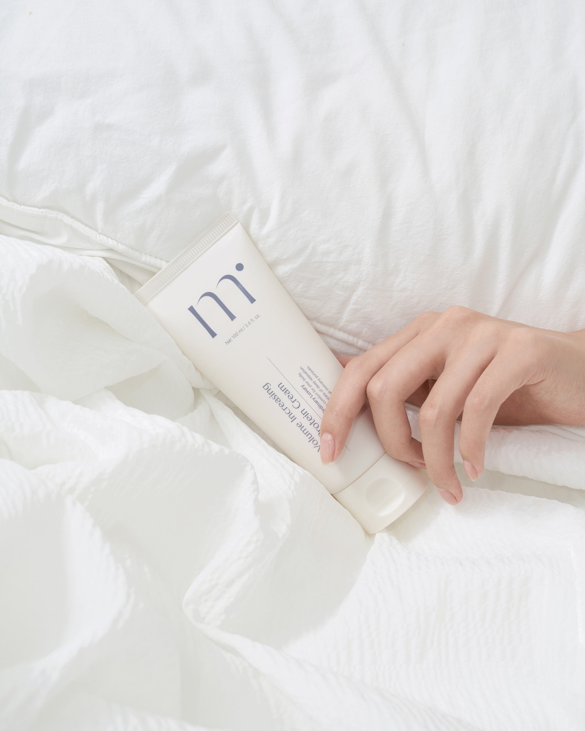 Molvany Protein Cream application showing smooth consistency