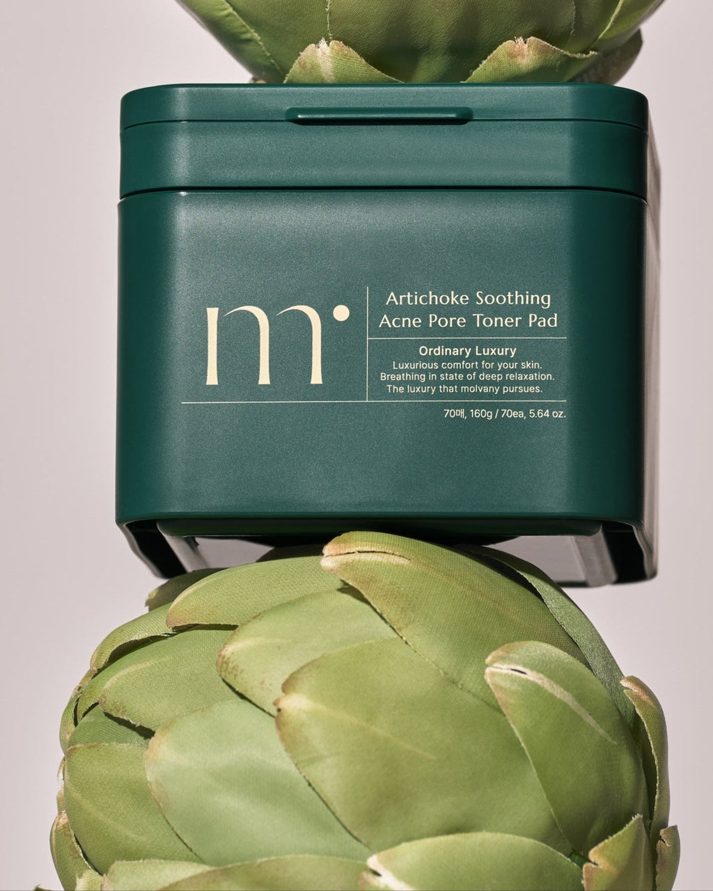 Molvany Artichoke Soothing Toner Pad individual pad front view