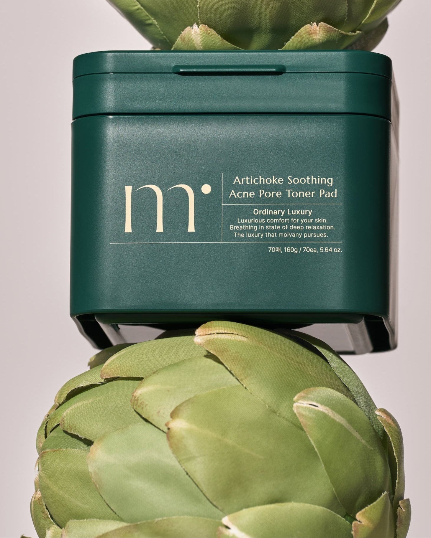 Molvany Artichoke Soothing Toner Pad individual pad front view