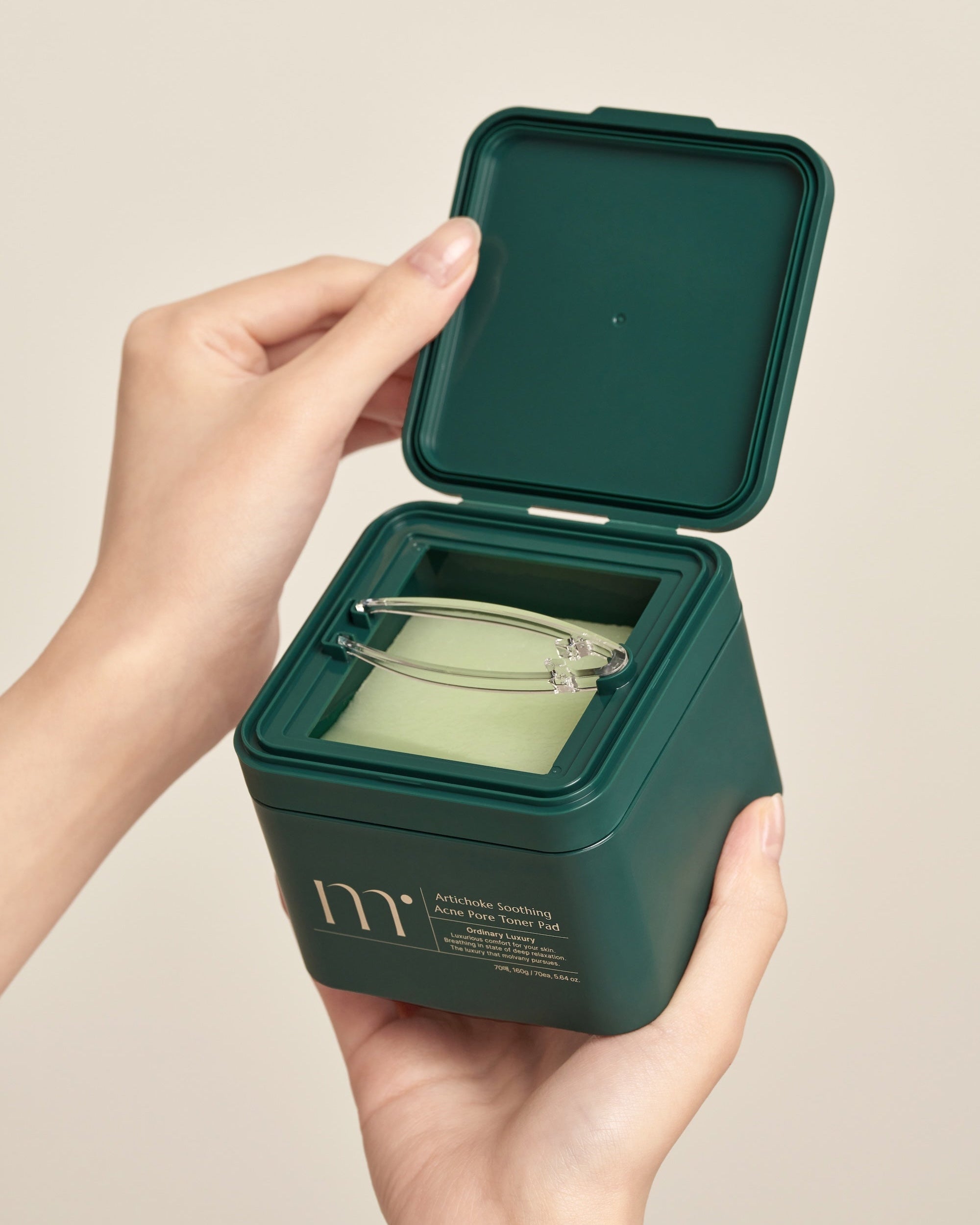 Molvany Artichoke Toner Pad jar packaging with pads visible